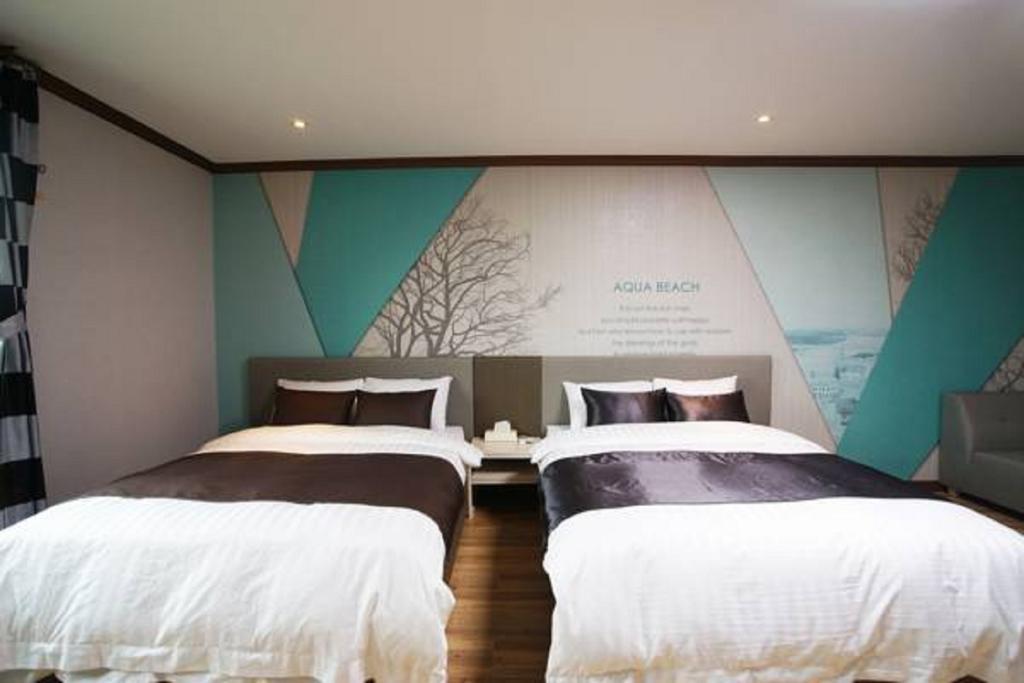 סאוגוויפו Seongsan Aqua Beach Hotel חדר תמונה