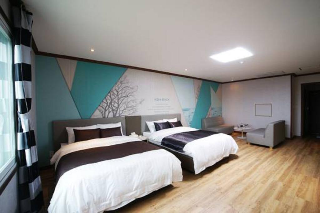 סאוגוויפו Seongsan Aqua Beach Hotel חדר תמונה