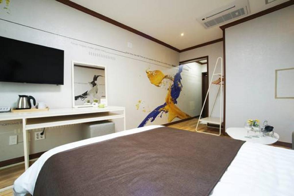 סאוגוויפו Seongsan Aqua Beach Hotel חדר תמונה